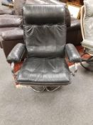 A mid twentieth century continental black leather and chrome easy chair, width 84 cm.