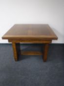 A 1930's oak pull out dining table