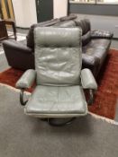 A mid twentieth century continental grey leather easy chair, width 84 cm.