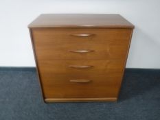 A mid twentieth century teak four drawer chest