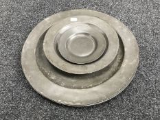 Five antique pewter plates CONDITION REPORT: The largest bottom two are 38cm in