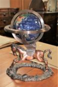 An impressive multi gemstone globe on ornate winged Pegasus base,