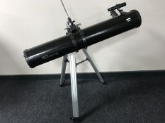 A Celestion Power Seeker 114EQ telescope on stand together with a set of 8x60 binoculars