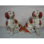 A pair of Staffordshire spaniels, height 28 cm.