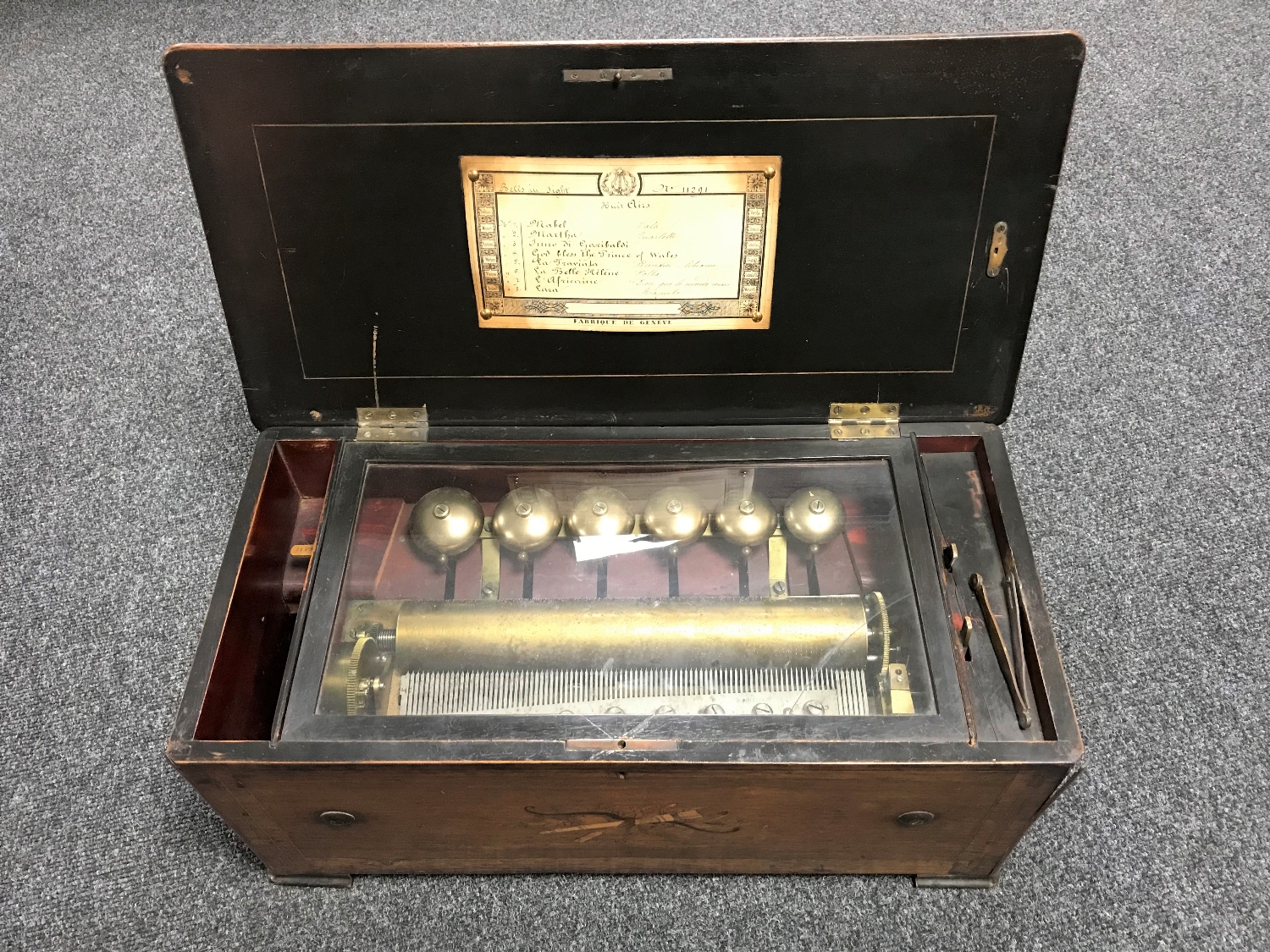 A 19th century inlaid rosewood Swiss cylinder music box CONDITION REPORT: Numerous