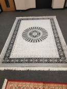 An Abusson carpet on black and grey ground 280 cm x 200 cm