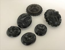 A bag of six Whitby jet brooches