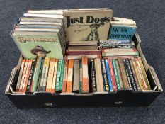 A box containing mid 20th century books including Penguin paperbacks, Just for Dogs by K.F.