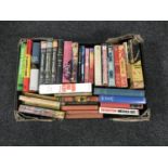 A box containing mid 20th century and later books; Ernest Hemingway,
