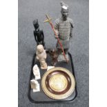 A tray of tourist pieces to include Chinese soldier, inlaid hardwood wall plaque,