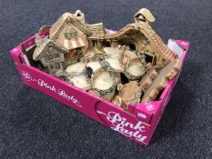 A box of assorted Pendelfin stands and houses