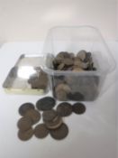A plastic tub containing Georgian and Victorian pennies and half pennies,