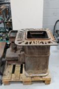An antique cast ion Tangye stove
