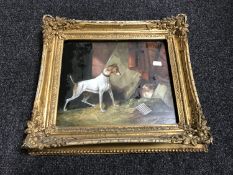 A gilt framed antiquarian oil on board depicting a dog stalking a cat