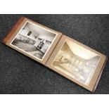 An antique leather bound photograph album by J. T.