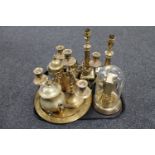 A tray of assorted brass ware including a pair of brass column table lamps,