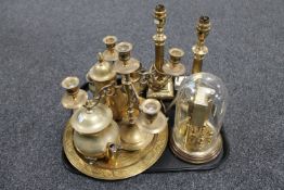 A tray of assorted brass ware including a pair of brass column table lamps,