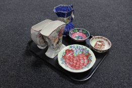 A tray of seven pieces of Maling lustre pottery to include to Rosalind pattern vases,