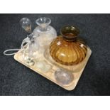 A tray of assorted glass ware to include amber glass oil lamp shade,