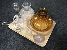 A tray of assorted glass ware to include amber glass oil lamp shade,