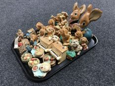 A tray of twenty-two assorted Pendelfin rabbit and dog figures together with seven further