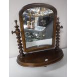 A Victorian oak toilet mirror