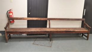 An antique pine bench,