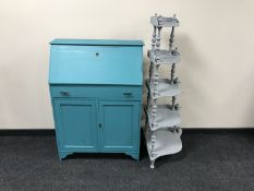 A painted oak lady's bureau together with a five tier painted whatnot stand