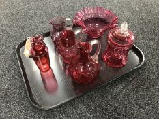 A tray of eight pieces of Victorian cranberry glass