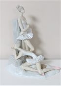 A Lladro figure of two ballerinas at a stone column (a/f) CONDITION REPORT: There is