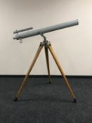 A 1920's chrome telescope with two lenses and 5' wooden tripod stand