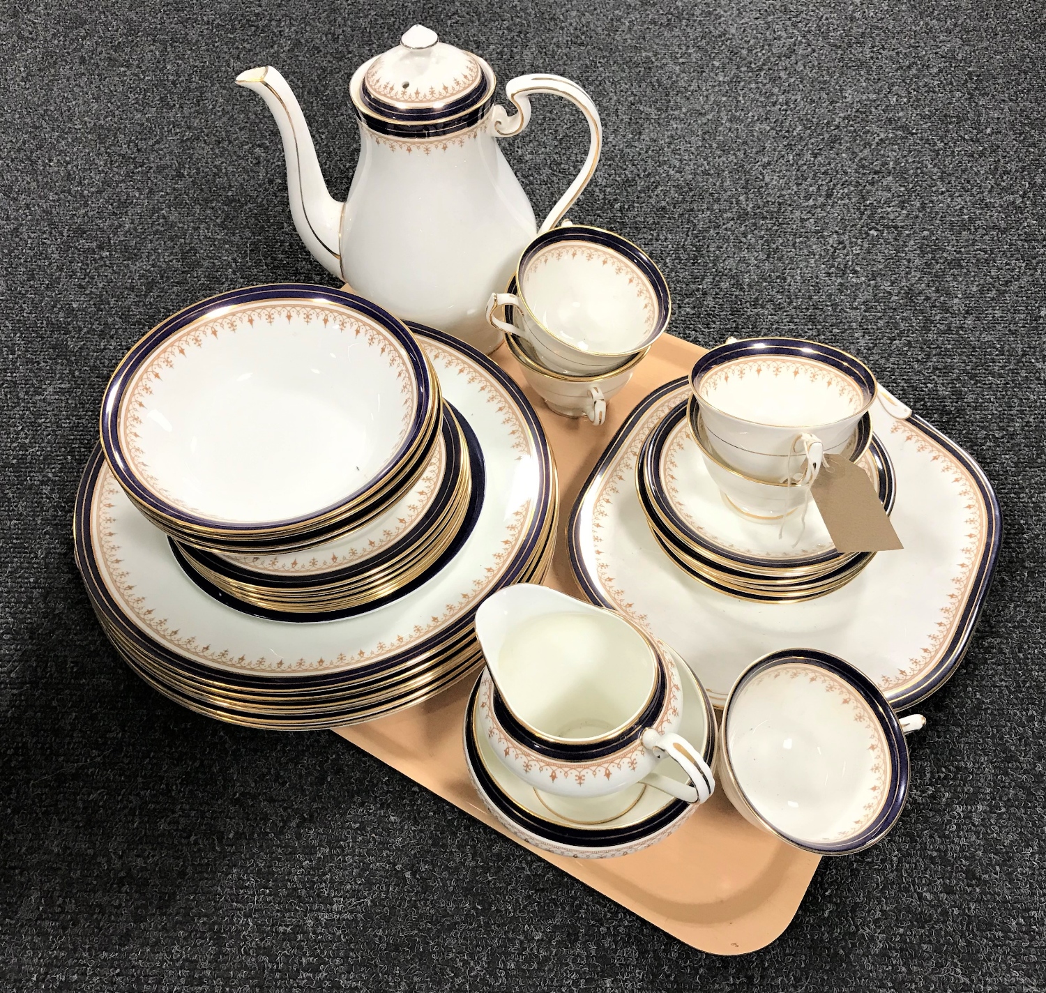 Thirty-two pieces of Leighton bone china tea and dinner ware