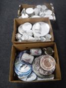 Three boxes containing continental white and gilt tea and dinner service, RAF collector's plates,