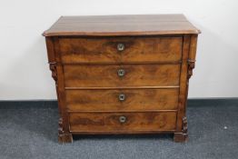 A nineteenth century continental mahogany four drawer chest