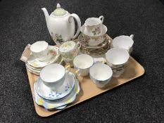 A tray containing Myott Clarice Cliff teapot, fifteen pieces of Royal Standard bone china,