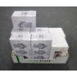 A box containing boxed ornaments to include five boxed Leonardo Collection silver art buddhas,