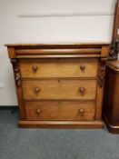 A Victorian mahogany four drawer chest,