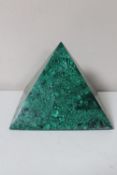 A large malachite panelled pyramid, the base 29 cm in each direction.