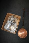 A box containing assorted plated wares, cutlery,