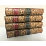 A set of four late 19th century leather bound and gilt volumes;