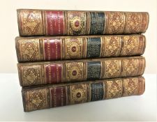 A set of four late 19th century leather bound and gilt volumes;