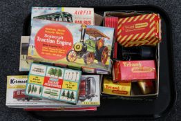 A collection of model railway items, part model kits, Merit railway accessories,