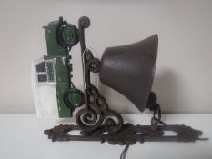 A cast iron Land Rover bell on bracket