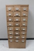 A mid 20th century metal twenty-four drawer index cabinet