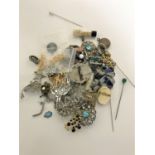 Two boxes of costume jewellery - brooches, necklaces, cross,