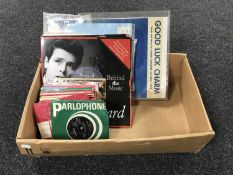 A box containing a small quantity of LP's and 45 singles including Cliff Richard, Elvis Presley,