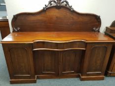 A Victorian mahogany serpentine fronted sideboard,