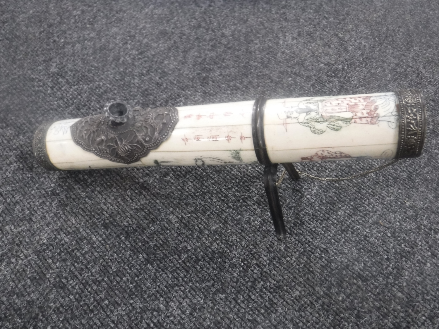 An ornate Chinese resin and metal pipe