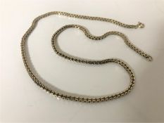 A yellow metal necklace, indistinctly stamped, length 40cm CONDITION REPORT: 11.