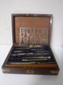 A set of mahogany and brass cased antique drawing instruments